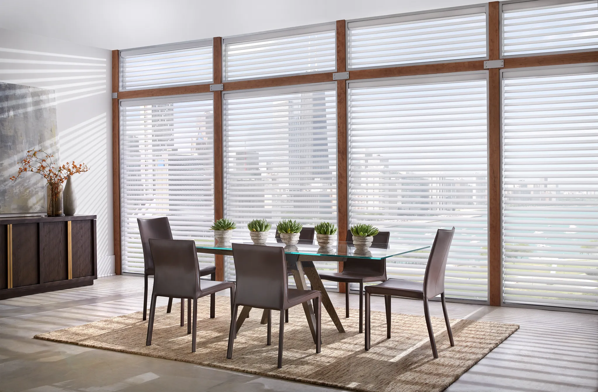 Sheer shades and Silhouette window shadings filtering daylight